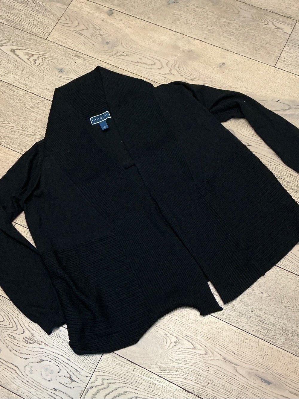 Woman’s Karen Scott black shawl neck cardigan. Medium. Ribbed bottom and collar.